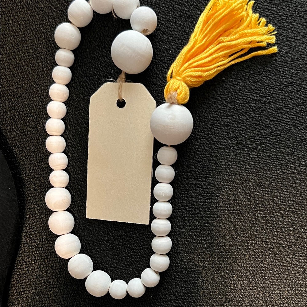 Blank card with 22 inches long White Beads & Yellow Tassel for decoration.